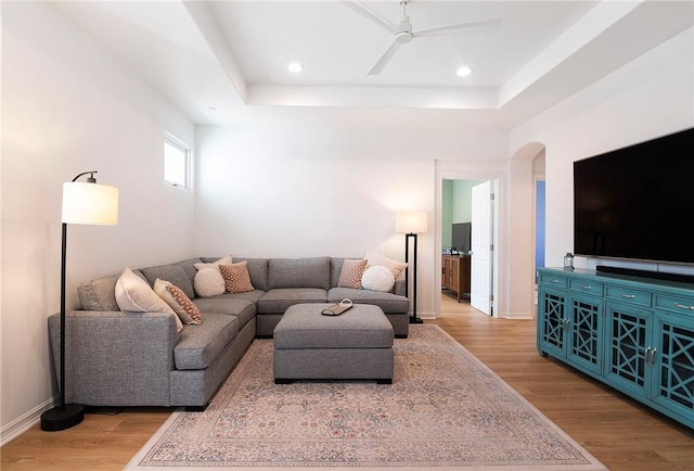 3417 Kildare Ct, Burbank, CA 91504 - living area featuring wood finished floors, arched walkways, ceiling fan, a tray ceiling, and recessed lighting