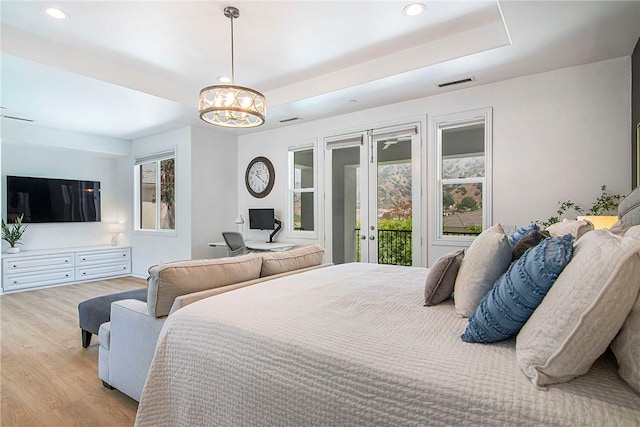3417 Kildare Ct, Burbank, CA 91504 - bedroom featuring french doors, access to outside, wood finished floors, recessed lighting, and a tray ceiling