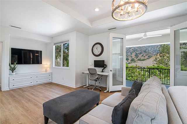 3417 Kildare Ct, Burbank, CA 91504 - living room with a desk, a chandelier, light wood-style flooring, recessed lighting, and a tray ceiling
