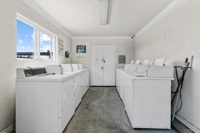390 N 1st St Unit 23, El Cajon, CA 92021 - shared laundry room featuring washing machine and clothes dryer, ornamental molding, and electric panel