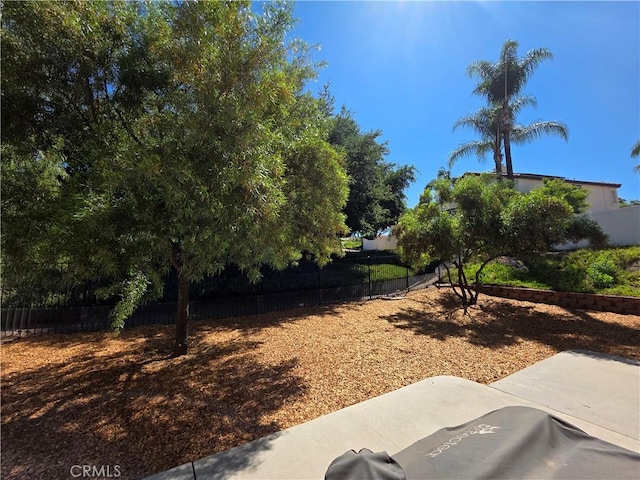 29390 Crest View Ln, Highland, CA 92346 - fenced backyard featuring a patio area
