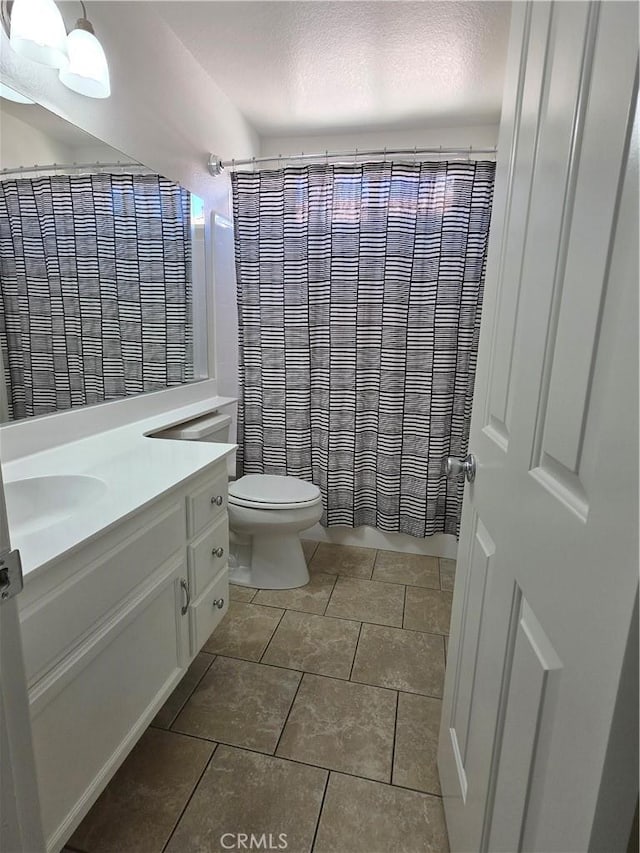 29390 Crest View Ln, Highland, CA 92346 - full bath with vanity, a textured ceiling, and a shower with shower curtain