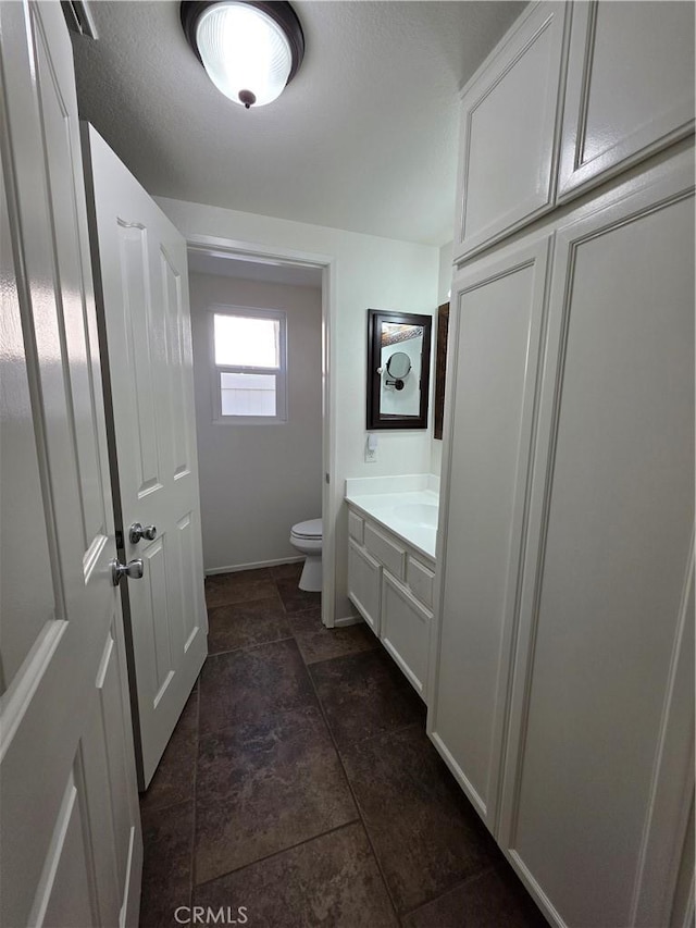 29390 Crest View Ln, Highland, CA 92346 - bathroom with vanity and stone finish flooring