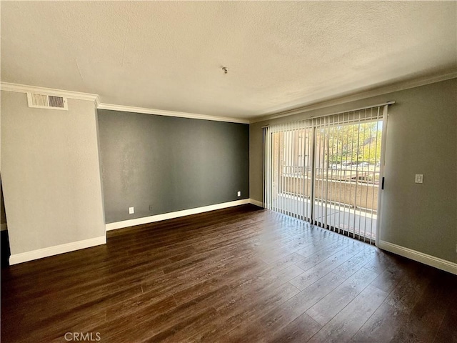1025 La Terraza Cir Unit 204, Corona, CA 92879 - spare room featuring crown molding, a textured ceiling, and dark wood-style floors