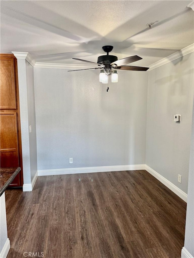 1025 La Terraza Cir Unit 204, Corona, CA 92879 - spare room featuring a ceiling fan, crown molding, and dark wood-style floors