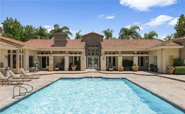 1025 La Terraza Cir Unit 204, Corona, CA 92879 - community pool featuring a patio area
