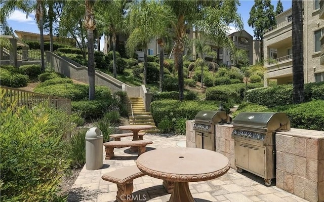 1025 La Terraza Cir Unit 204, Corona, CA 92879 - view of patio / terrace featuring area for grilling and stairs