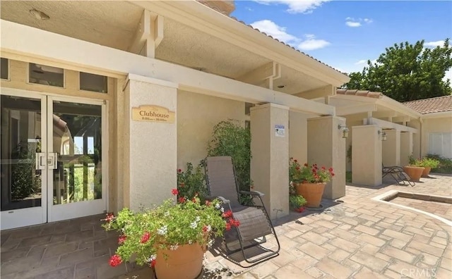 1025 La Terraza Cir Unit 204, Corona, CA 92879 - view of patio featuring french doors
