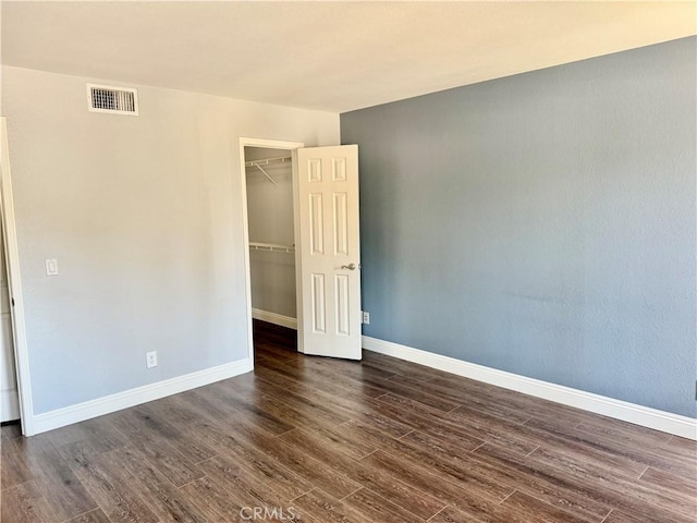 1025 La Terraza Cir Unit 204, Corona, CA 92879 - unfurnished room with baseboards and dark wood finished floors