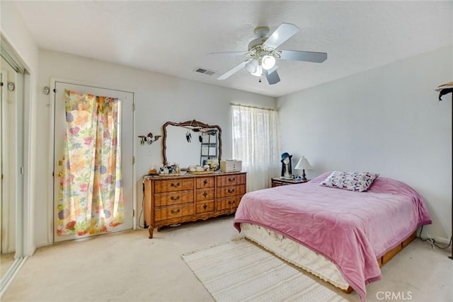 21919 Standing Rock Ave, Apple Valley, CA 92307 - carpeted bedroom with a ceiling fan