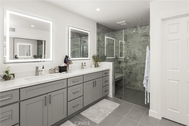 8009 E Eucalyptus Trl, Orange, CA 92869 - bathroom featuring double vanity, a stall shower, tile patterned floors, and recessed lighting