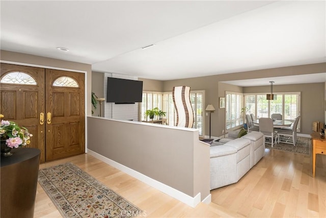 8009 E Eucalyptus Trl, Orange, CA 92869 - entryway with light wood-style floors and baseboards