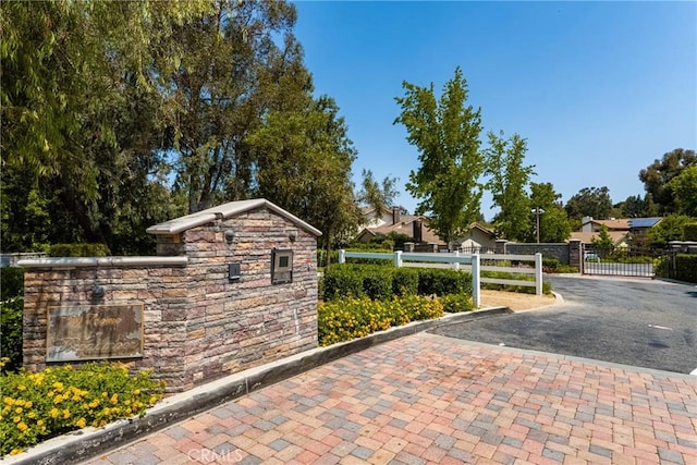 8009 E Eucalyptus Trl, Orange, CA 92869 - community sign with a gate