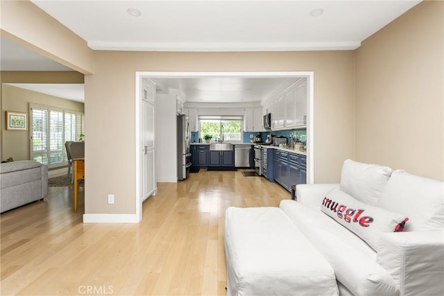 8009 E Eucalyptus Trl, Orange, CA 92869 - living room featuring light wood finished floors and baseboards