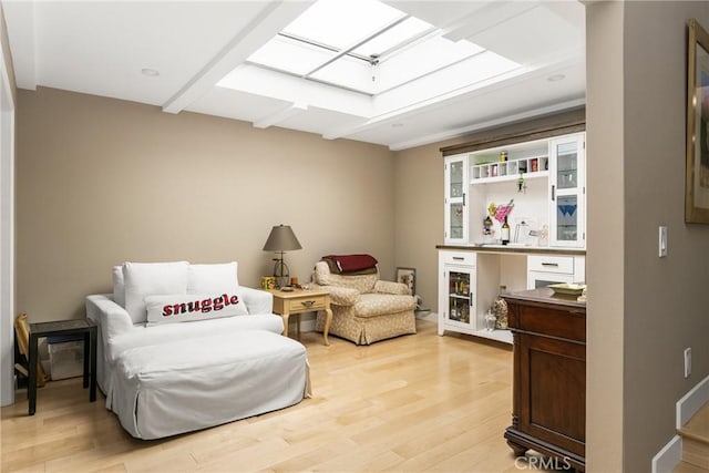 8009 E Eucalyptus Trl, Orange, CA 92869 - living area featuring a skylight and light wood-style flooring