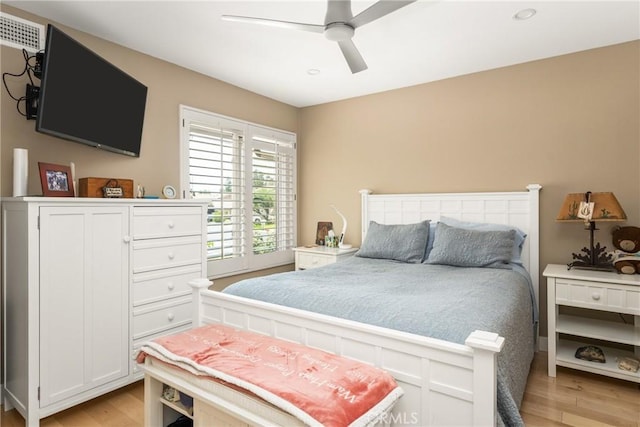 8009 E Eucalyptus Trl, Orange, CA 92869 - bedroom with light wood-type flooring and a ceiling fan