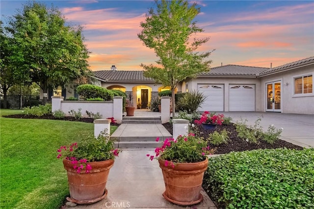 1708 Victoria Way, San Marcos, CA 92069 - view of front of property featuring an attached garage, a tile roof, and stucco siding