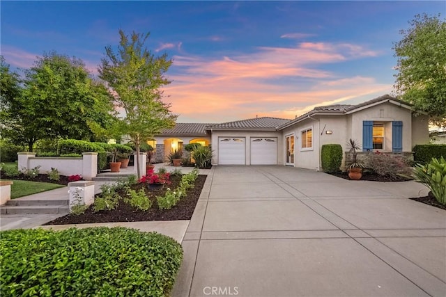 1708 Victoria Way, San Marcos, CA 92069 - view of front facade featuring a garage, a tiled roof, driveway, and stucco siding