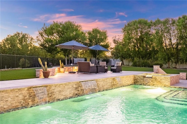1708 Victoria Way, San Marcos, CA 92069 - pool at dusk featuring a fenced backyard and a patio area