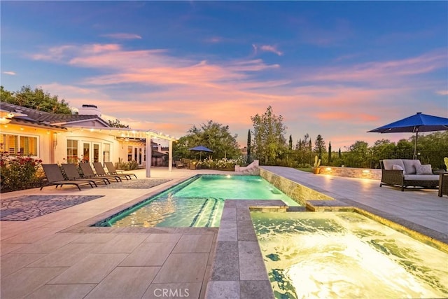 1708 Victoria Way, San Marcos, CA 92069 - pool at dusk with an in-ground hot tub, french doors, a patio, and an outdoor pool