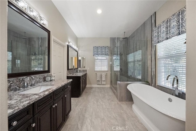 1708 Victoria Way, San Marcos, CA 92069 - bathroom with a shower stall, a freestanding tub, two vanities, and marble look tiles