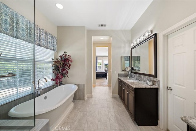 1708 Victoria Way, San Marcos, CA 92069 - bathroom featuring a freestanding bath and vanity