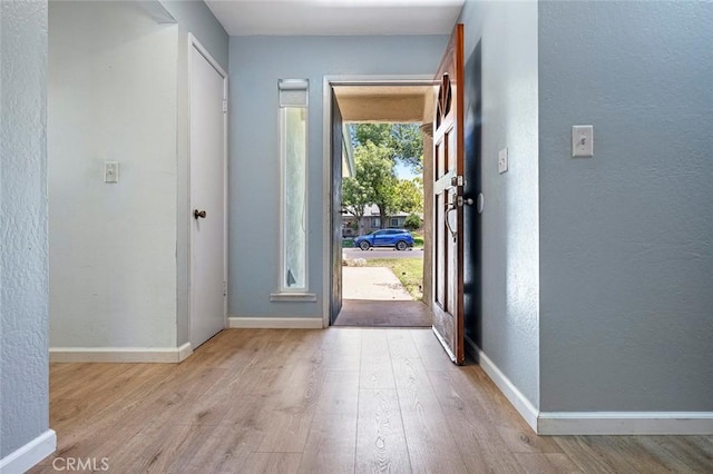 3318 Stanford Ave, Clovis, CA 93611 - foyer entrance featuring wood finished floors and a textured wall