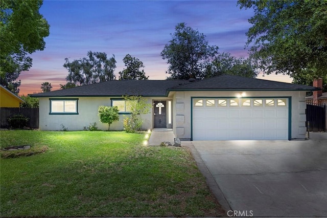 3318 Stanford Ave, Clovis, CA 93611 - ranch-style house with stucco siding, concrete driveway, and a garage