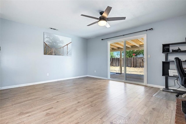 3318 Stanford Ave, Clovis, CA 93611 - unfurnished living room featuring wood finished floors and ceiling fan