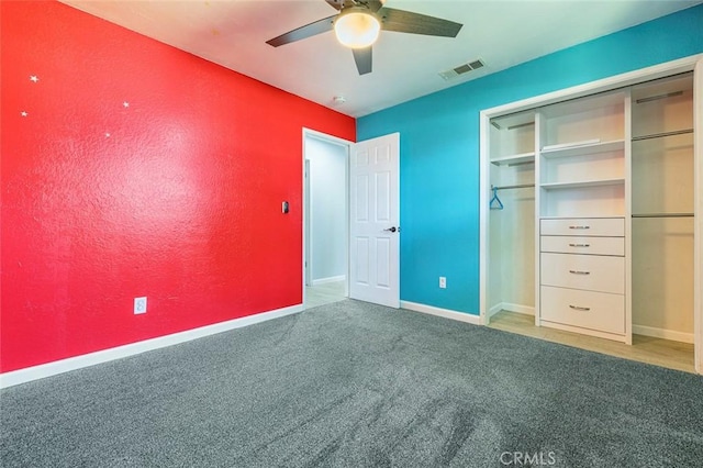 3318 Stanford Ave, Clovis, CA 93611 - unfurnished bedroom with carpet flooring, a closet, and a ceiling fan