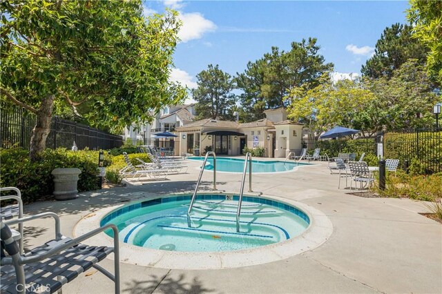 8 Diamant Way, Aliso Viejo, CA 92656 - community pool featuring a hot tub and a patio