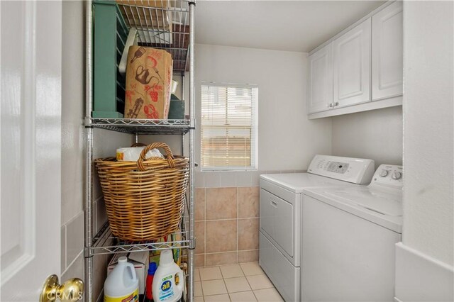8 Diamant Way, Aliso Viejo, CA 92656 - washroom featuring cabinet space, washing machine and dryer, light tile patterned flooring, and tile walls