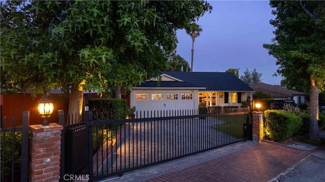 4328 Sunset Ave, Montrose, CA 91020 - view of front of home featuring a fenced front yard, driveway, a garage, and a gate