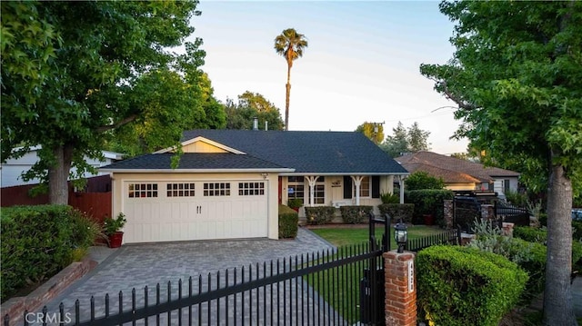4328 Sunset Ave, Montrose, CA 91020 - ranch-style house featuring a fenced front yard, an attached garage, driveway, a porch, and stucco siding
