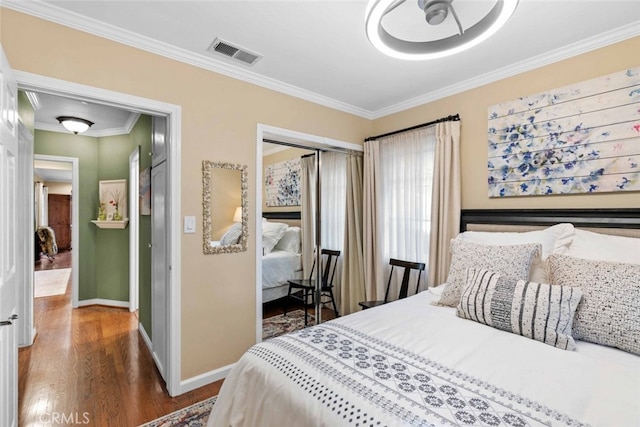 4328 Sunset Ave, Montrose, CA 91020 - bedroom featuring a closet, wood finished floors, and crown molding