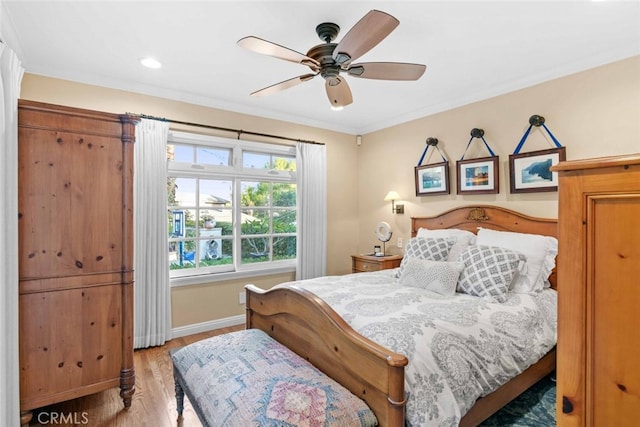 4328 Sunset Ave, Montrose, CA 91020 - bedroom with light wood-style flooring, crown molding, a ceiling fan, and recessed lighting