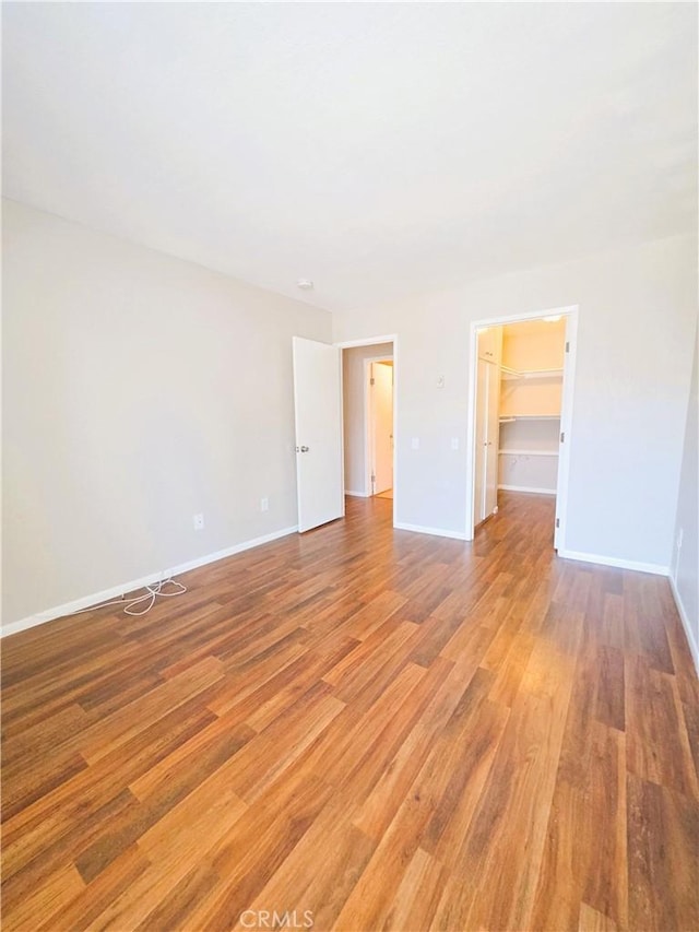 3550 Ruffin Rd Unit 142, San Diego, CA 92123 - spare room featuring light wood finished floors and baseboards