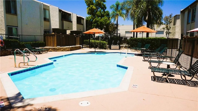 3550 Ruffin Rd Unit 142, San Diego, CA 92123 - community pool featuring a patio area and a residential view
