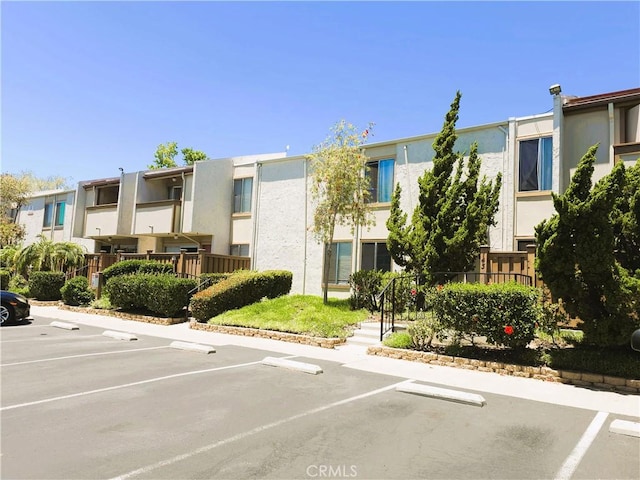 3550 Ruffin Rd Unit 142, San Diego, CA 92123 - view of property featuring uncovered parking