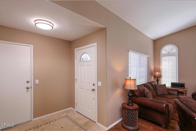 20325 Tamara Pl, Santa Clarita, CA 91350 - foyer entrance with plenty of natural light and inlaid floor details
