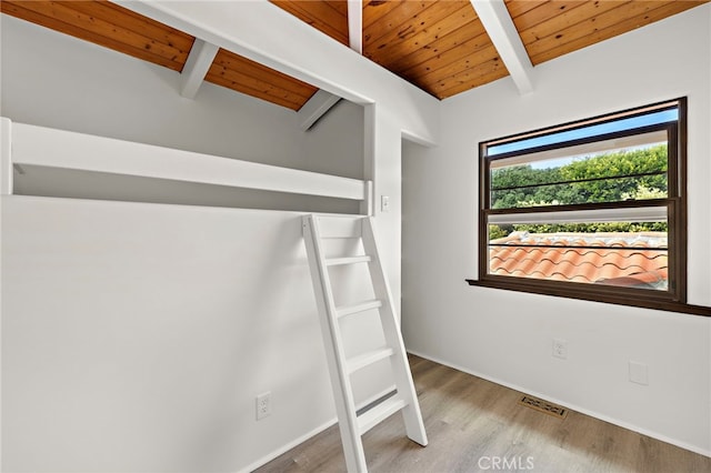 490 Agate, Laguna Beach, CA 92651 - unfurnished bedroom with a wood ceiling with exposed beams and wood finished floors