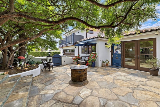 490 Agate, Laguna Beach, CA 92651 - patio / terrace with french doors, a patio, and a fire pit
