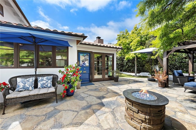 490 Agate, Laguna Beach, CA 92651 - view of patio with french doors and an outdoor living space with a fire pit