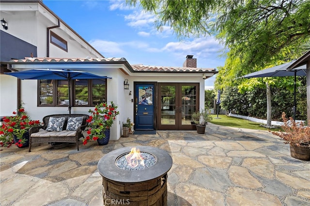 490 Agate, Laguna Beach, CA 92651 - view of patio / terrace with french doors and an outdoor fire pit
