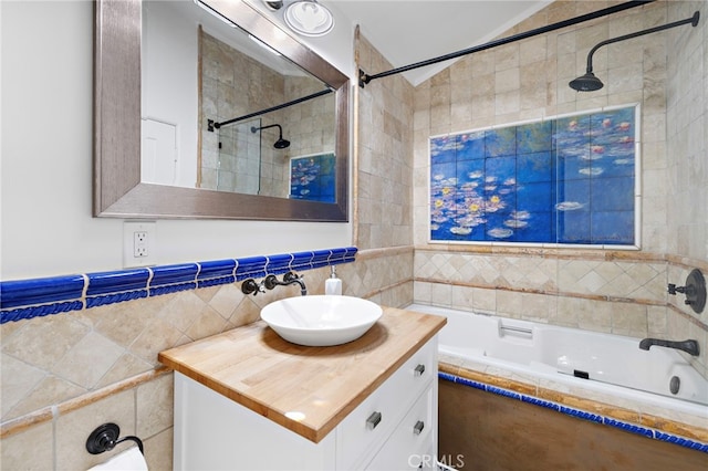 490 Agate, Laguna Beach, CA 92651 - bathroom featuring tile walls, vanity, and tiled shower / bath