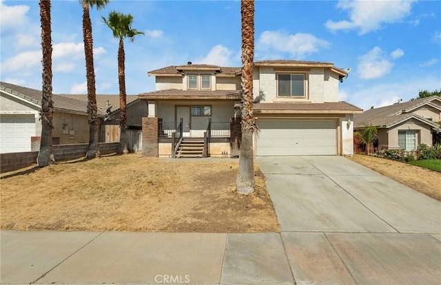 9304 Palo Verde Dr, Hesperia, CA 92344 - traditional-style house featuring stucco siding, driveway, and a garage