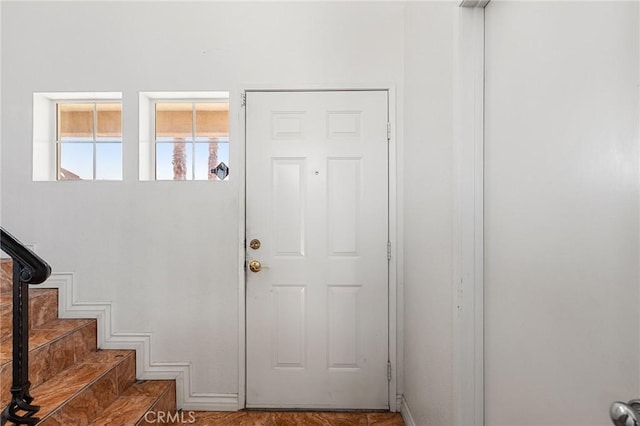 9304 Palo Verde Dr, Hesperia, CA 92344 - entryway featuring stairs and baseboards
