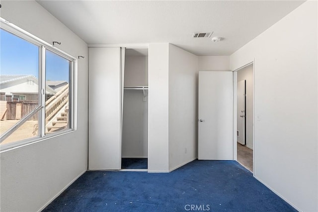 9304 Palo Verde Dr, Hesperia, CA 92344 - unfurnished bedroom featuring carpet flooring and a closet