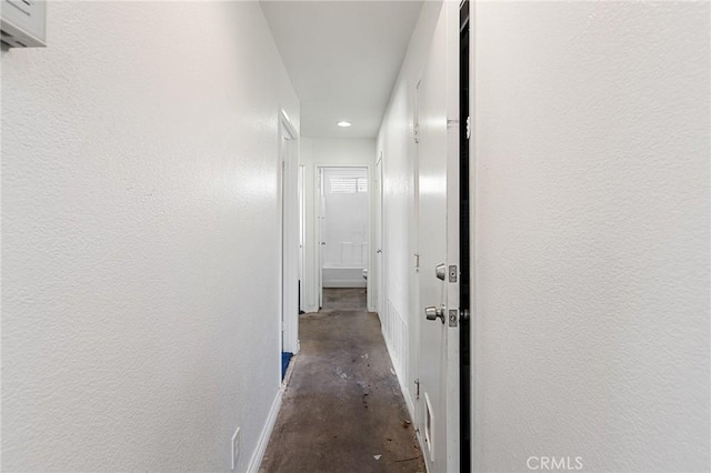 9304 Palo Verde Dr, Hesperia, CA 92344 - hallway featuring concrete flooring and recessed lighting
