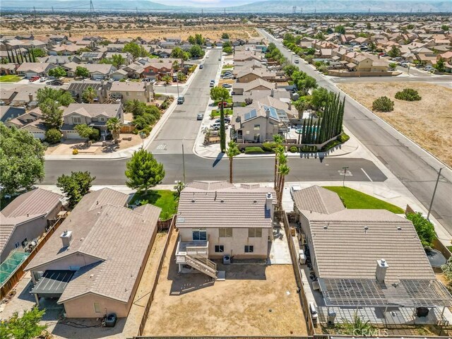9304 Palo Verde Dr, Hesperia, CA 92344 - aerial perspective of suburban area with a mountain backdrop